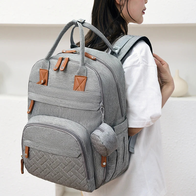 MAVO™ - Stilvoller & Geräumiger Wickelrucksack mit Kinderwagenhaken und Wickelmatte